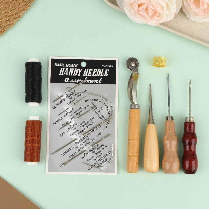 Leather sewing tools kit for diy craft and repair featuring a handy needle assortment in a clear plastic package with black and white labeling, containing various sewing needles including straight curved mattress and sail needles alongside wooden-handled tools such as a thimble awl and seam ripper.
