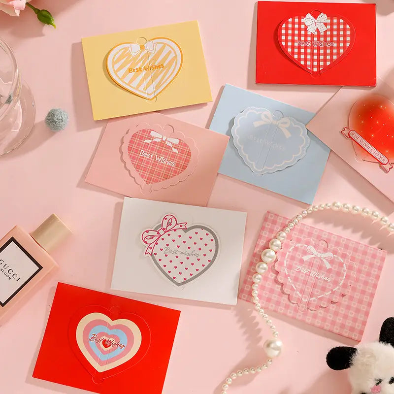 A collection of 3d heart greeting cards set in pastel and vibrant colors featuring decorative bow designs and best wishes text for valentine and wedding notes.