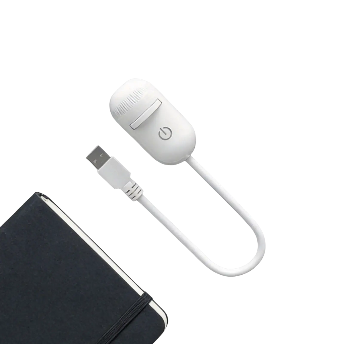 White usb-powered electric hair trimmer with sleek design and minimalist button beside 2-in-1 galaxy usb car projector light night light