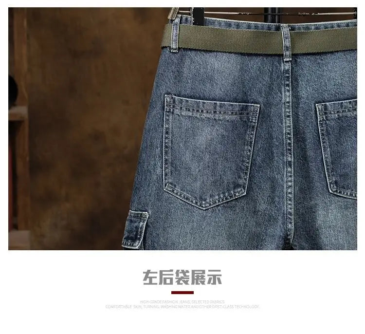 Men denim cargo jeans casual loose blue denim pants with olive green belt in front view.