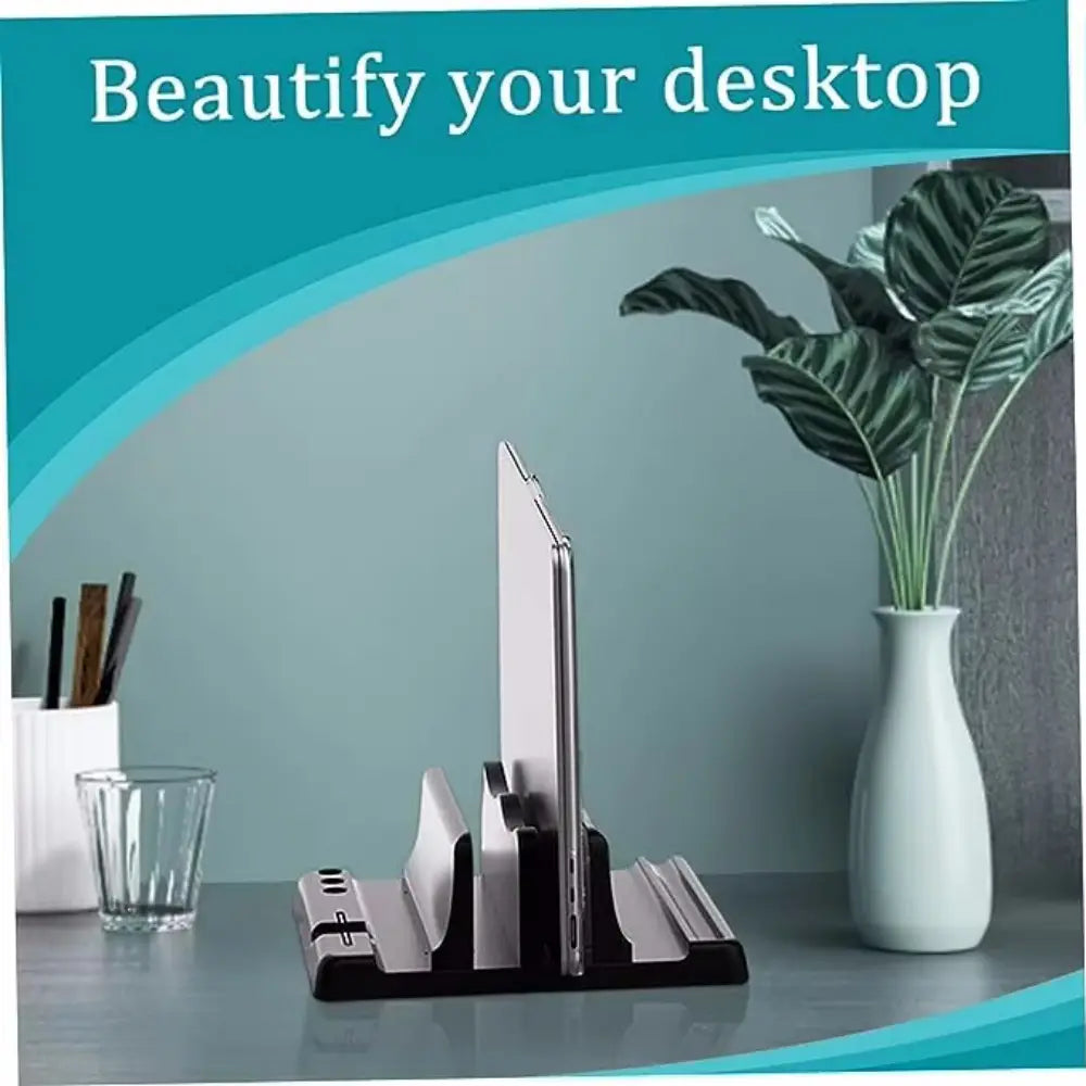 Black and silver tablet stand made of metal with adjustable width and multiple slots for organizing devices and customizing opening size for charging and display.