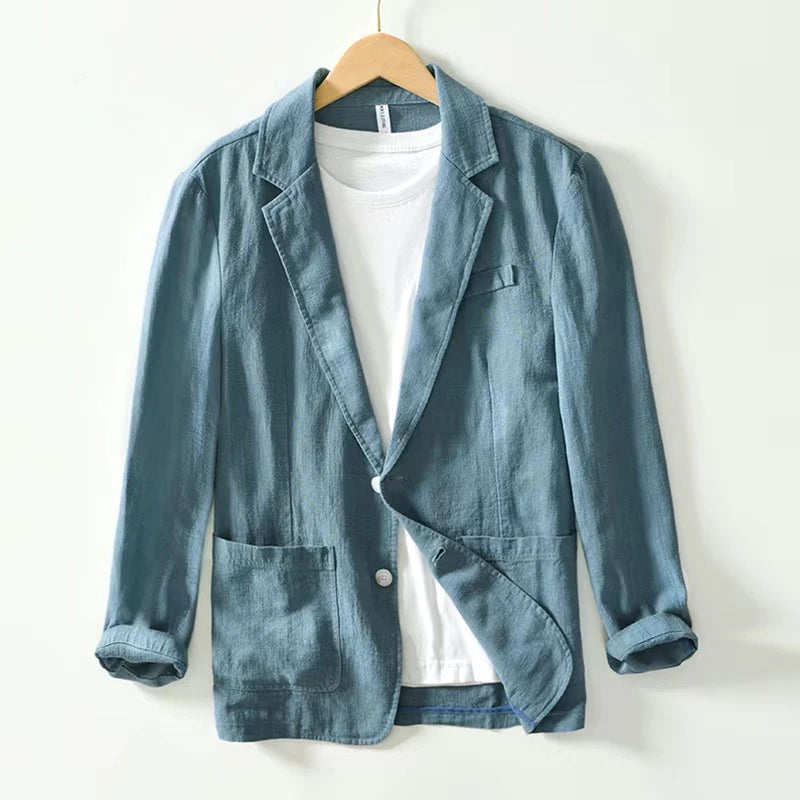 Blue linen men cotton casual retro blazer jacket with single button closure and rolled-up sleeves.