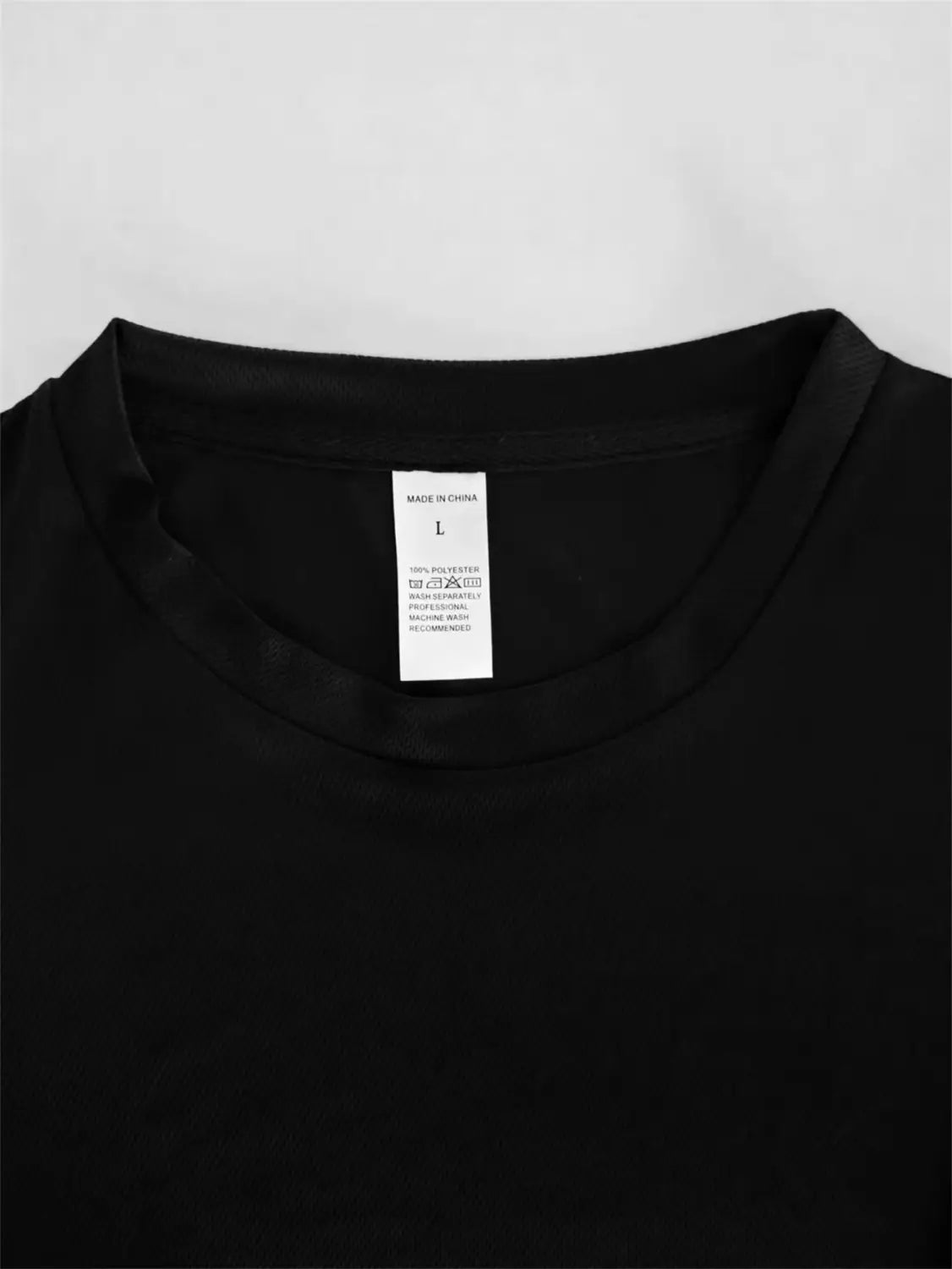 Mens funny letter printed casual streetwear tee in black cotton featuring a white care label inside the collar.