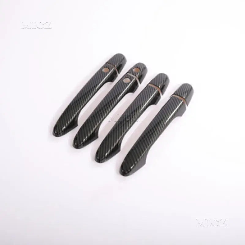 Juego de cuatro cubiertas de manijas de puerta para automóviles con textura de fibra de carbono negra, diseñadas para los modelos Honda Civic y CR V de 2012 a 2016.