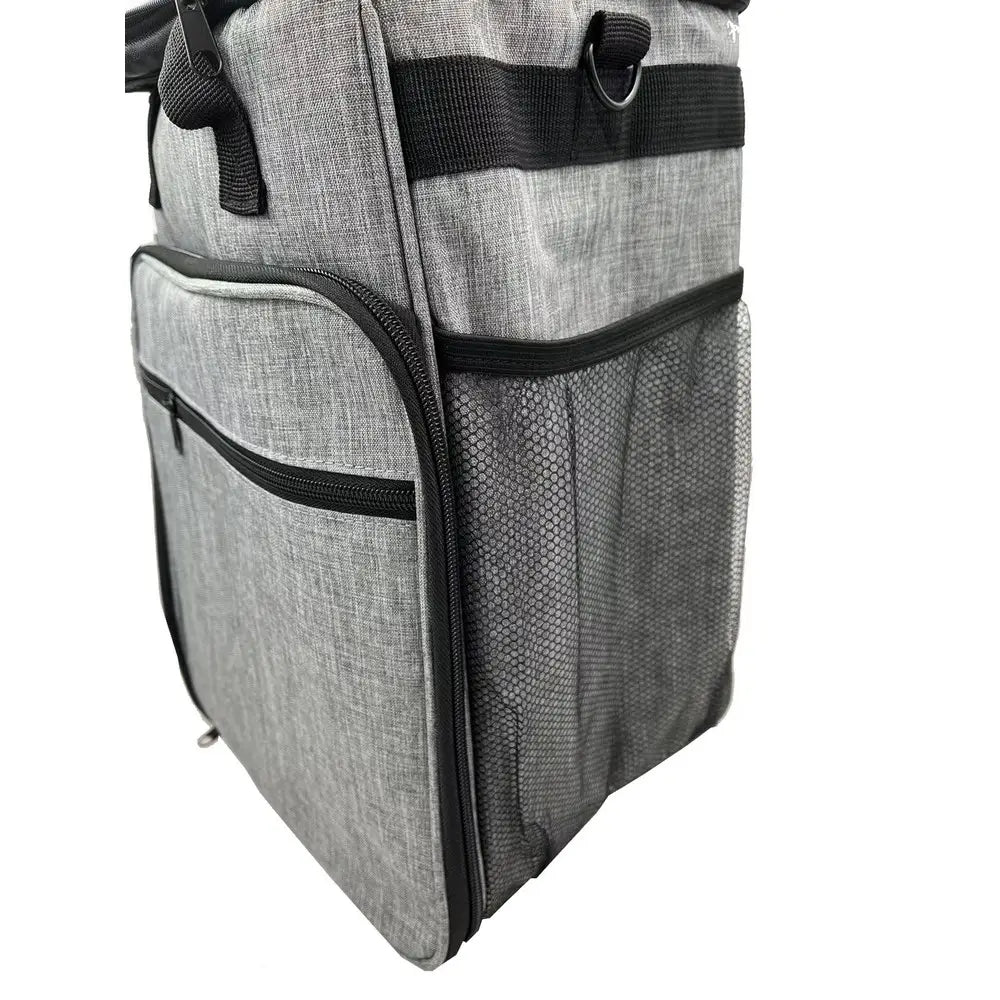 gray textured fabric dog travel bag organizer backpack with black zipper accents and mesh side pocket designed as a travel bag and food carrier airline approved