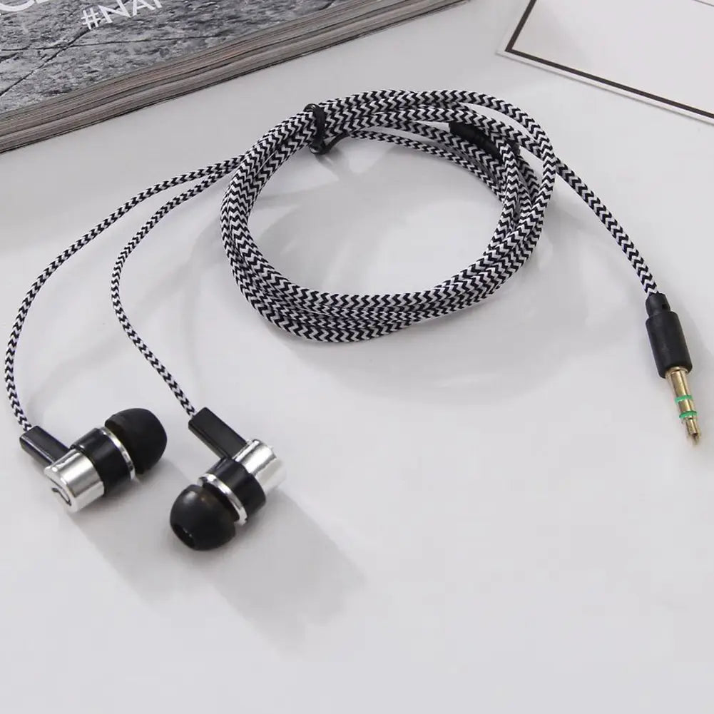 Black and silver in-ear wired headphones with bass stereo effect and a braided black and white cable with volume control