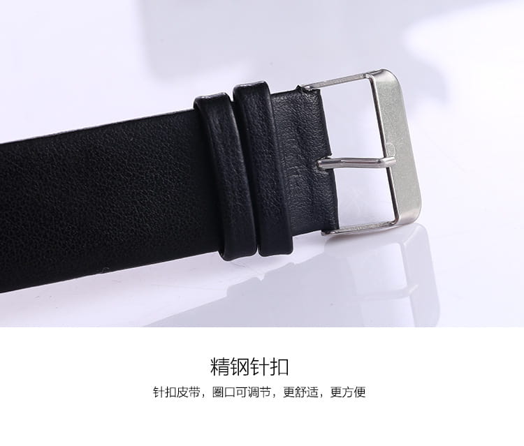 Black leather strap with a polished silver-toned buckle for a women luxury leather quartz watch with a transparent dial.