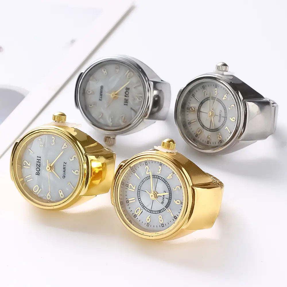 gold and silver ring watch styles featuring pearl-like faces with gold-tone numerals designed as quartz finger jewelry suitable for unisex gifts.