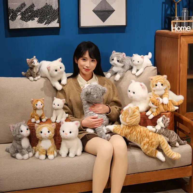 plush toys soft cute kitten stuffed animals pillow featuring various colors and patterns including white gray orange tabby and calico made of plush material for comfort and decoration.