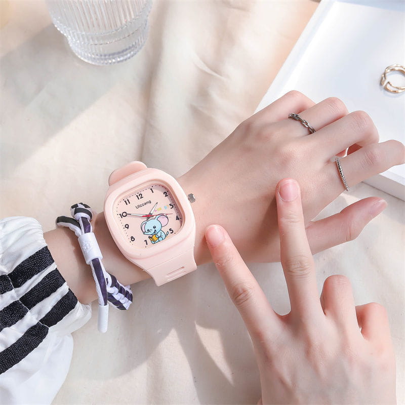 Pink silicone kids luminous cartoon elephant watch featuring a digital display and a cartoon character face with black numerals on the dial.