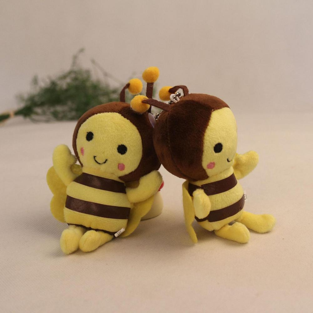 cute yellow and brown bee stuffed animal plush toy featuring soft fabric, striped abdomen, and fuzzy antennae as a bee stuffed keychain accessory