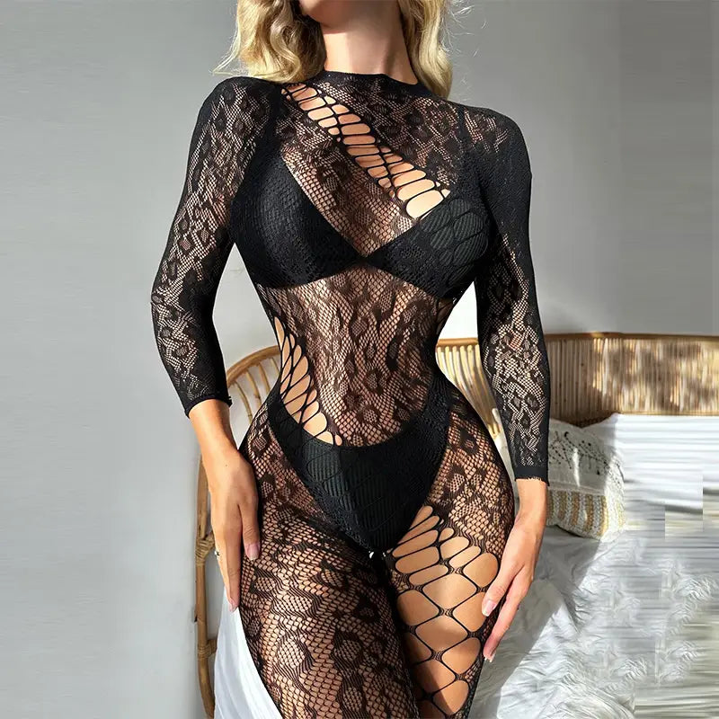Black lace long sleeve bodysuit featuring a sheer patterned mesh design in black lace material.