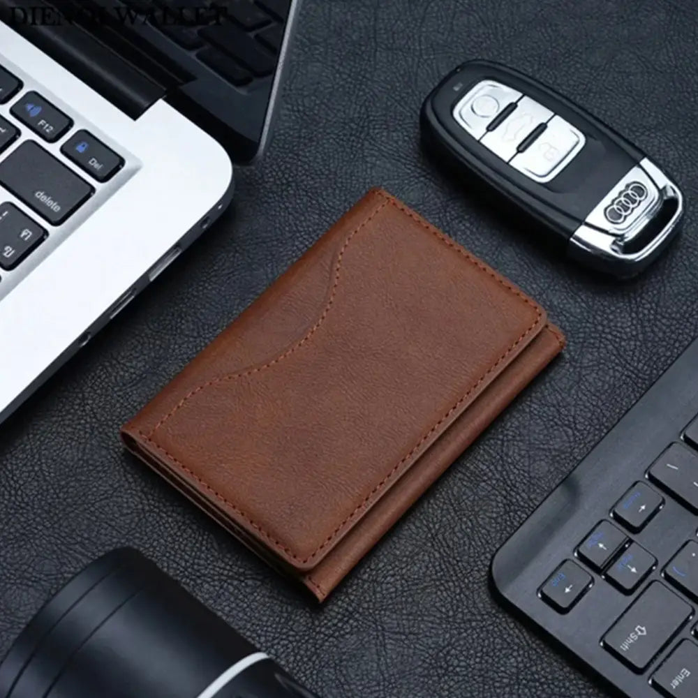 brown leather magnetic trifold card wallet with stitched edges and minimalist design shown from the front angle