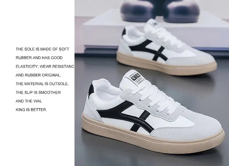 Sneakers décontractées pour hommes, chaussures de marche légères, en blanc et noir, avec une superposition en daim gris texturé, arborant le logo classique Onitsuka Tiger sur le côté et une semelle extérieure en caoutchouc beige.