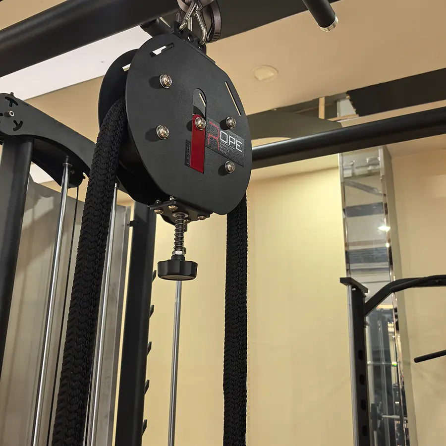 Black ope brand commercial rope climbing machine cable pulley with adjustable resistance features a textured rope and metallic hardware.