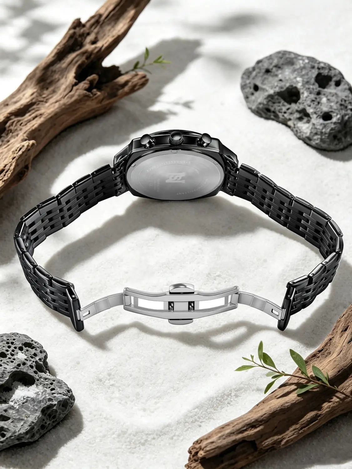 Men’s stainless steel chronograph watch featuring a black ceramic case with a sleek interlocking link bracelet and polished silver-tone clasp.
