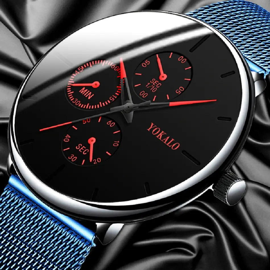 Montre chronographe à quartz ultrafine pour hommes de Yokalo, avec un cadran noir, des aiguilles rouges et des sous-cadrans, un boîtier ton argent, et une sangle en maille bleu azur.