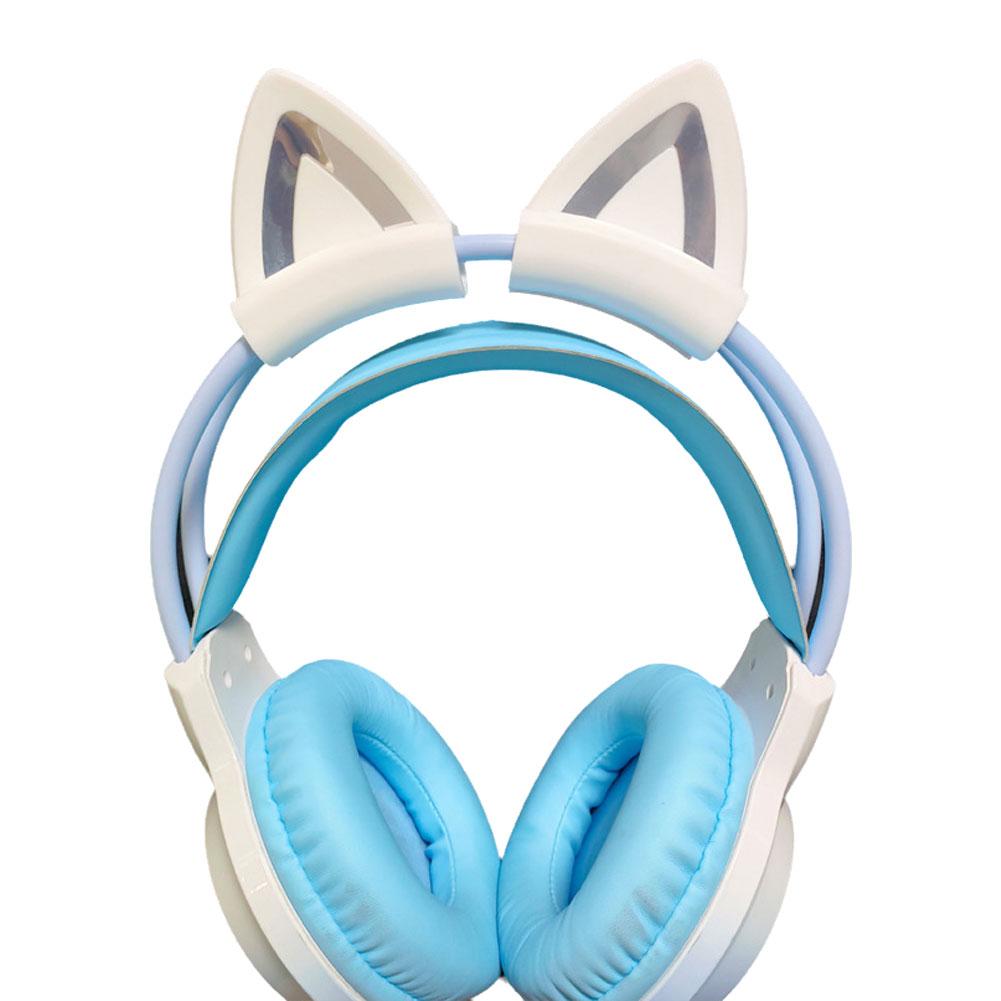 Attaches pour casque avec oreilles de chat en silicone bleu clair et blanc, avec des oreillettes rembourrées souples conçues pour un usage audio confortable.