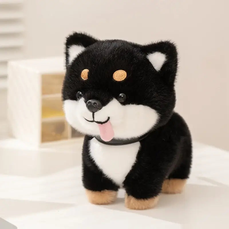 Adorable black and white plush shiba inu dog stuffed animal toy with tan accents on paws ears and round golden eyes.