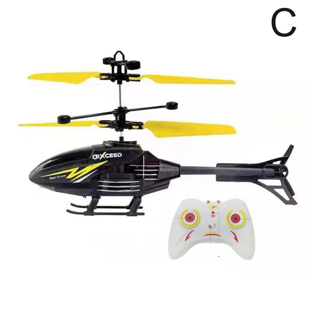 Black and yellow exceed branded remote control induction suspension helicopter toy with a white controller featuring red and yellow accents.