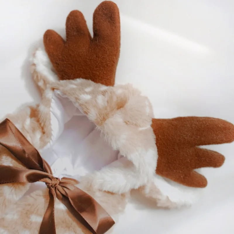 a plush reindeer-themed pet dog clothes gift bag with brown felt antlers white faux fur trim and a matching satin ribbon bow for winter costume use