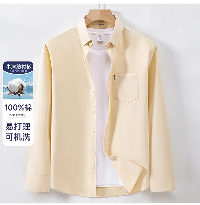 A pale yellow men cotton oxford long sleeve casual shirt made of 100 percent pure cotton featuring a button-down collar and front buttons.