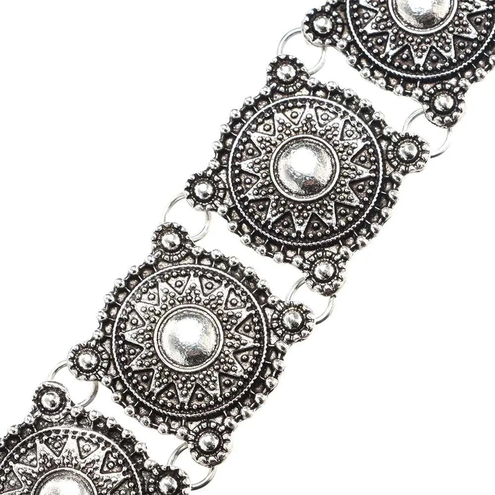 Boho silver vintage jewelry set belt buckle in silver tone with intricate sunburst patterns and detailed embossed designs.