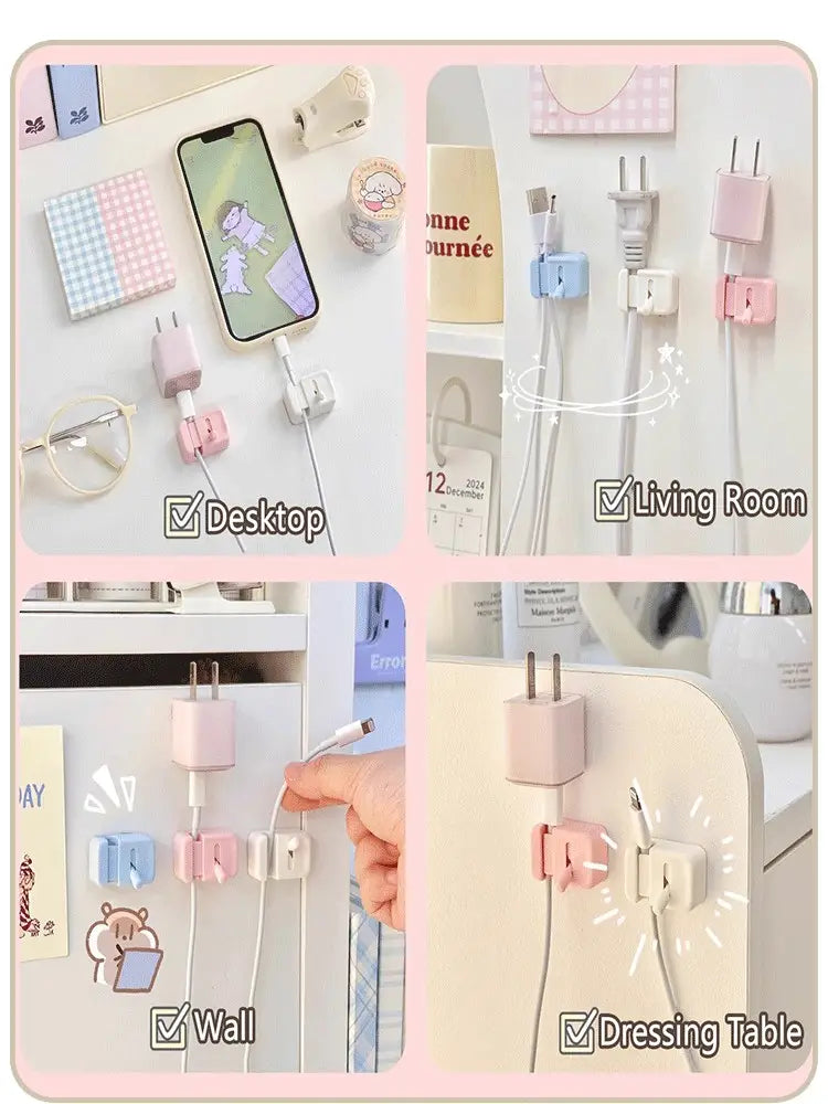 Pince de câble de bureau sans perçage, organisateur de cordons, présentant des supports en plastique rose et blanc de teintes pastel, au design minimaliste, idéale pour organiser les câbles sur les bureaux ou les murs.