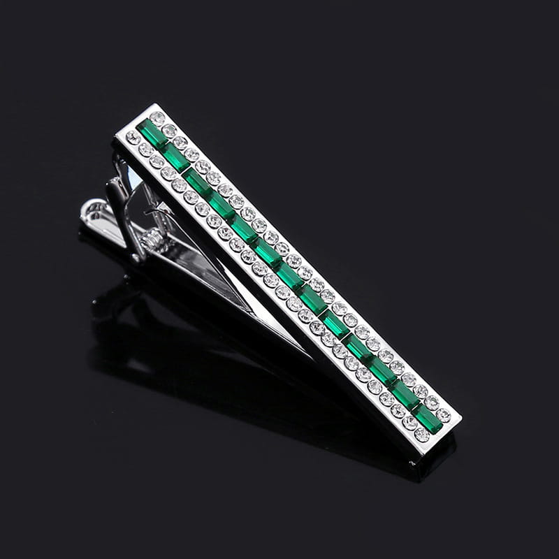 Silver tie bar with a central row of emerald green rectangular stones flanked by clear rhinestones from the crystal rhinestone tie clip set.