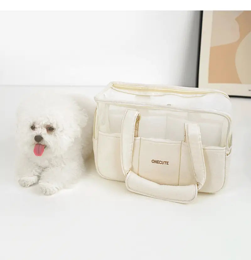 Sac à dos cabas pour chien de petite taille en toile respirante de couleur crème de la marque onecute, avec panneaux latéraux transparents et plusieurs compartiments.