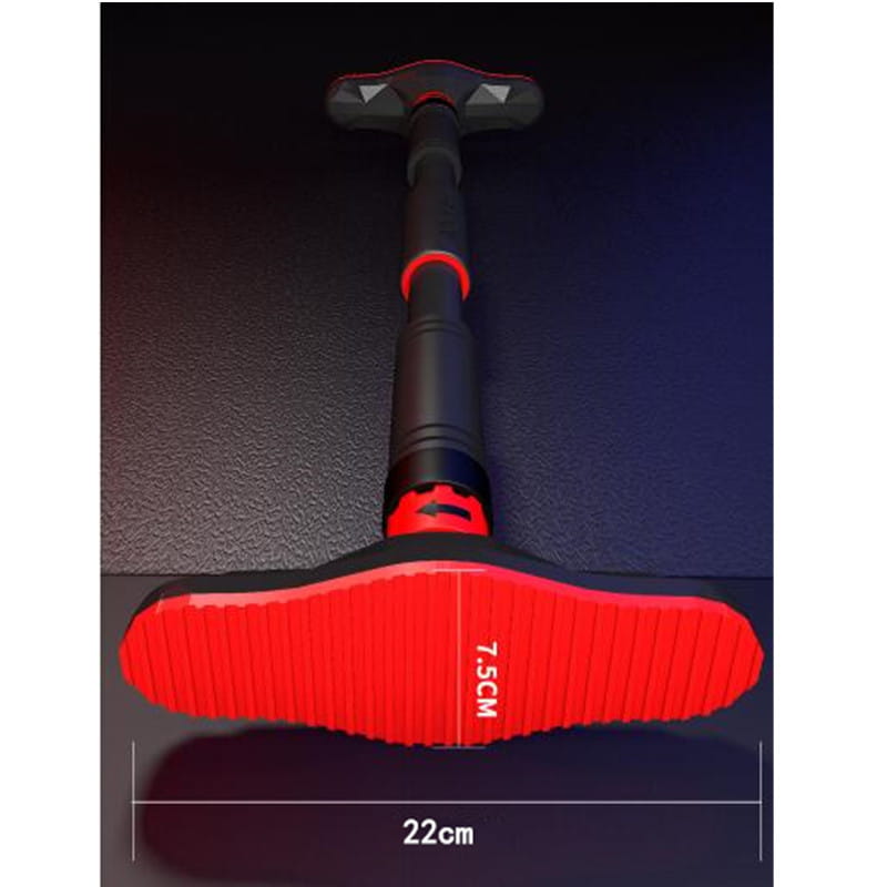 Barre de traction pour porte ajustable rouge et noire avec surfaces de prise texturées, conçue pour les exercices de fitness à domicile.