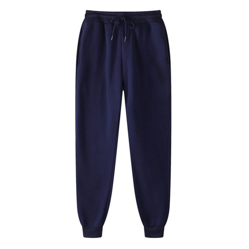 Joggers impresos de hombre estilo casual streetwear en azul marino, con cinturilla ajustable con cordón y puños elásticos, diseñados para la comodidad y el estilo.