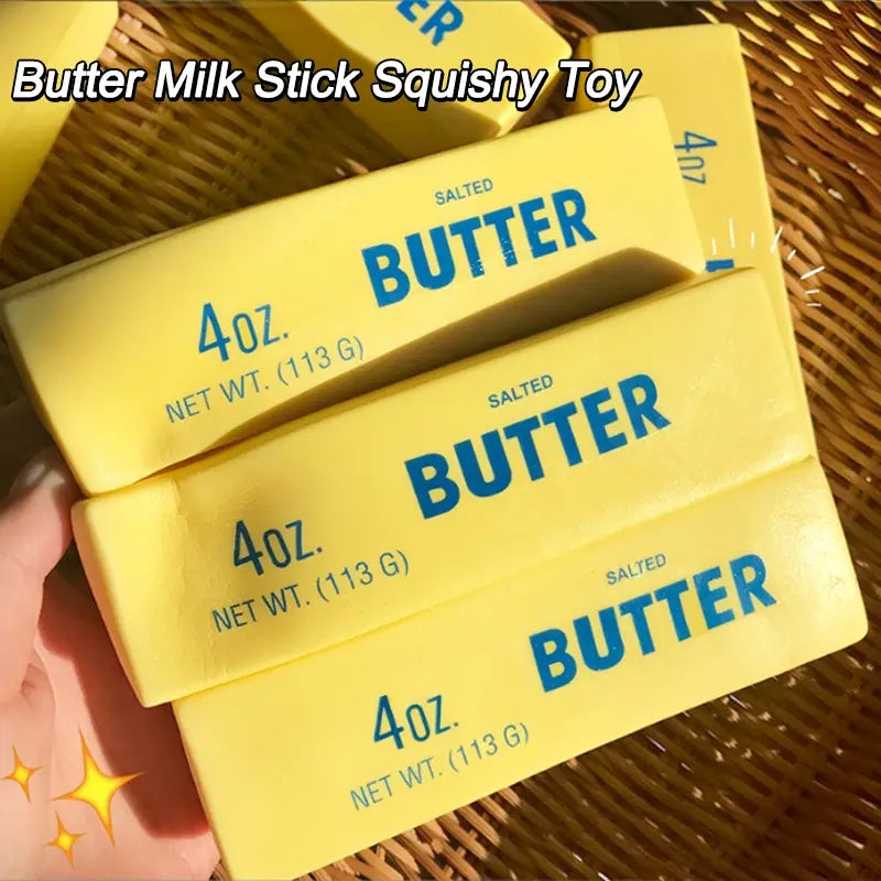 slow rising yellow butter stick stress relief toy designed as a soft squishy salted butter package with blue lettering