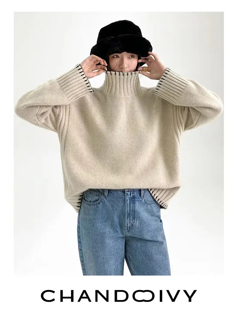 Cream-colored pure wool turtleneck sweater for women featuring ribbed knit texture and black striped cuffs.