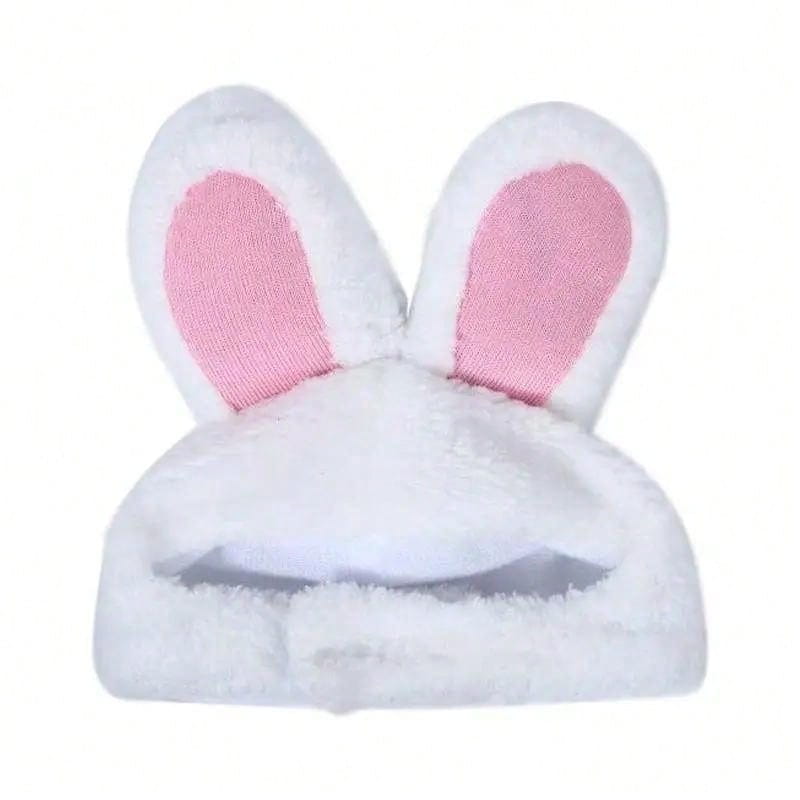 Diadema esponjosa blanca con orejas de conejo, con forro interno rosa, elaborada con material de peluche, diseñada como tocado de disfraz ajustable para gorro de mascota.