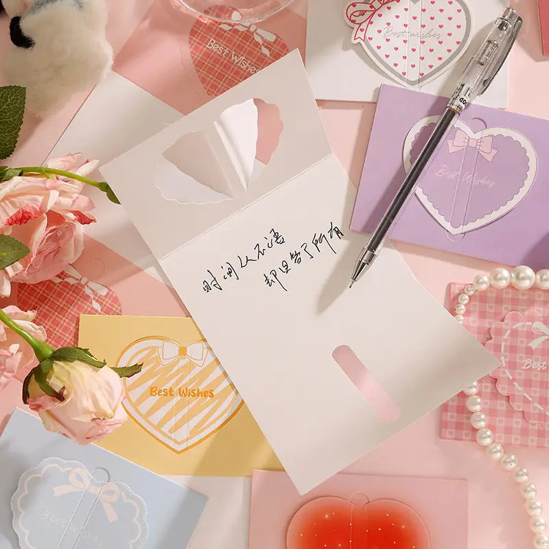 white paper note card with heart-shaped cutouts and handwritten chinese text from the 3d heart greeting cards set pastel valentine wedding notes.