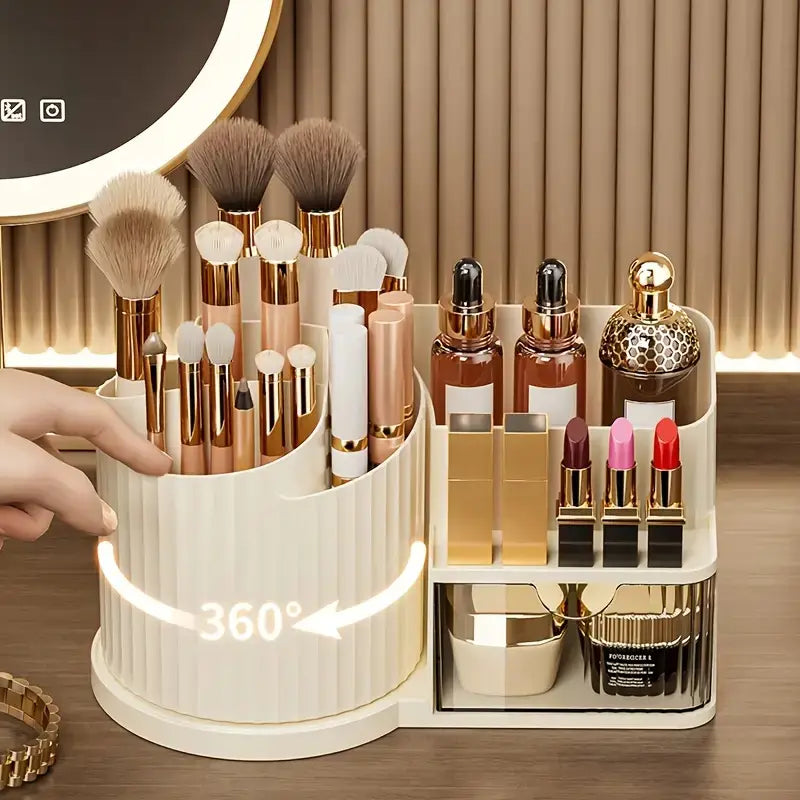 Cream-colored ribbed plastic makeup organizer with a 360-degree rotating base and mirrored compartments featuring a brush holder and large capacity skincare storage.
