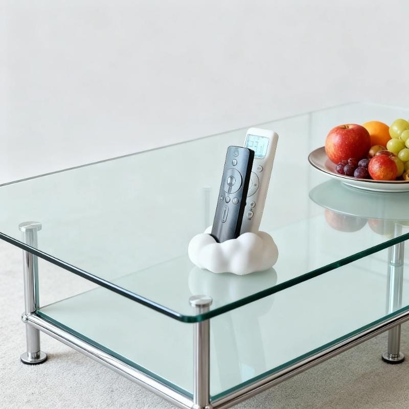 white cloud-shaped remote control holder made of durable material holding two remotes for organized living rooms desktop use