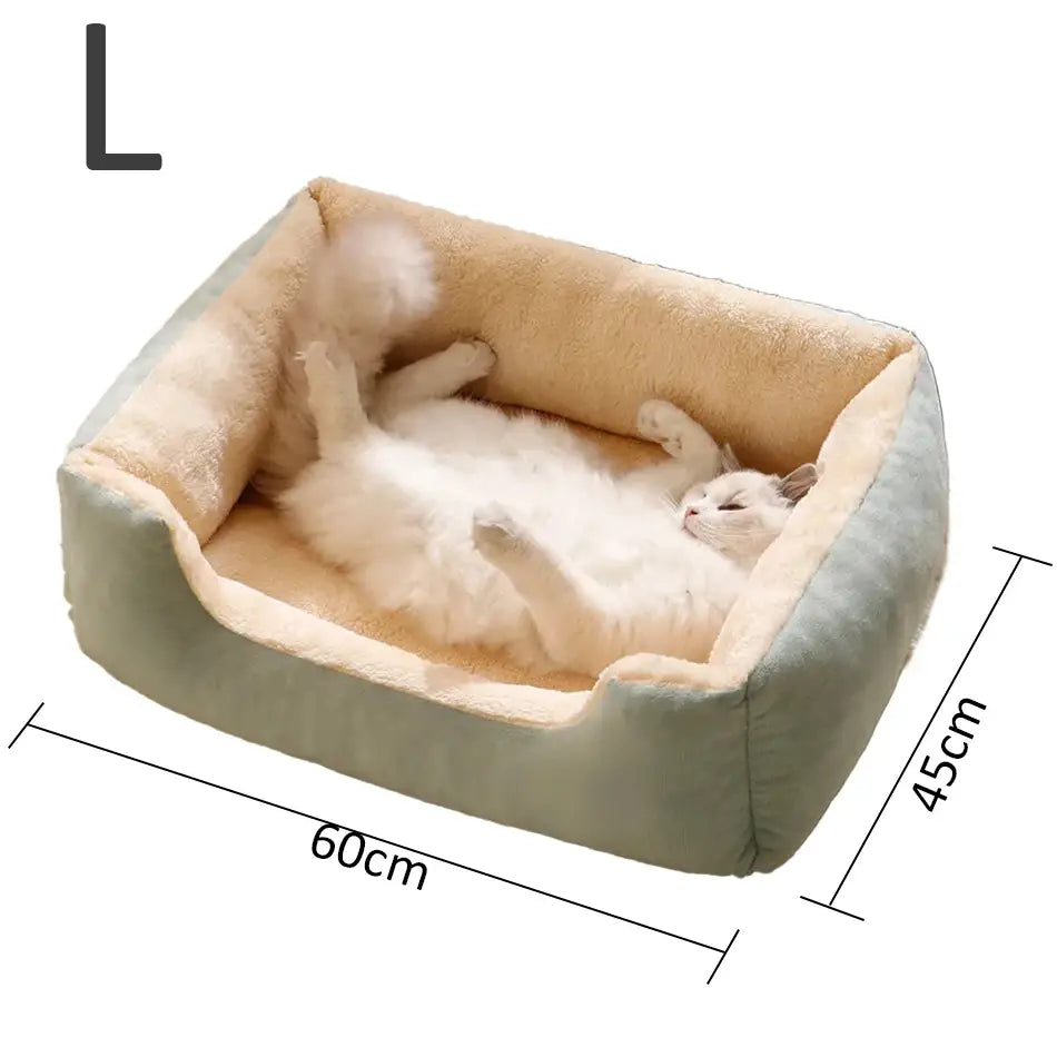A plush rectangular cat bed with a soft mint green exterior and a cushioned beige plush interior for comfortable pet resting.