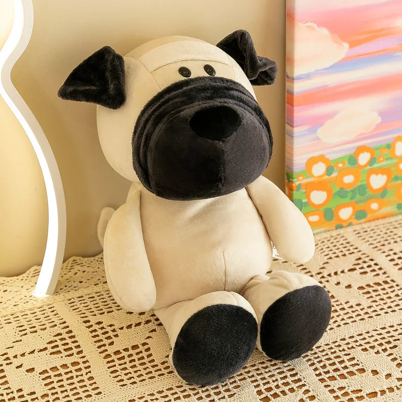 Muñeco de pug de peluche color crema con orejas, nariz y almohadillas de las patas negras, de la colección de muñecos blandos de animales de la jungla.