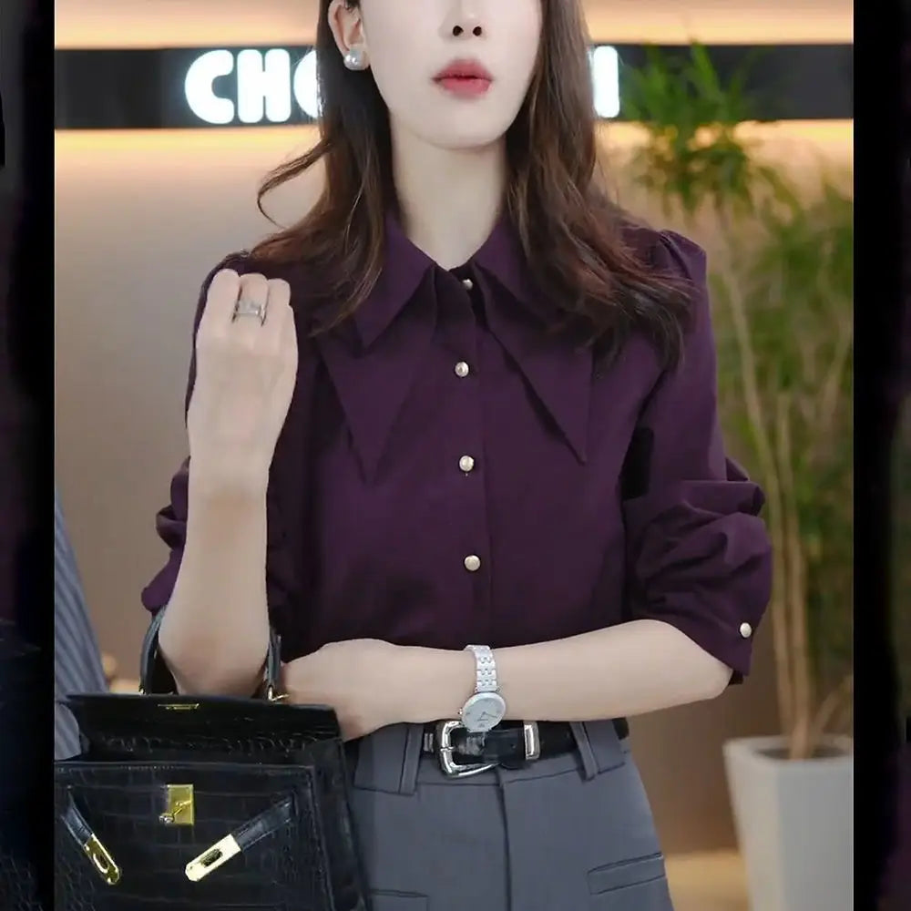 Purple satin blouse long sleeve button top with a collar, gold buttons, and puffed sleeves featuring modname=ckeditor design.