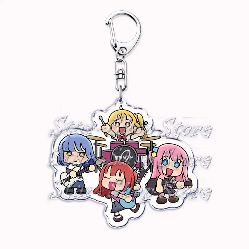 Clear acrylic keychain featuring four chibi-style anime girls from Bocchi the Rock with blue, blonde, red, and pink hair holding guitars and drums in a band formation.