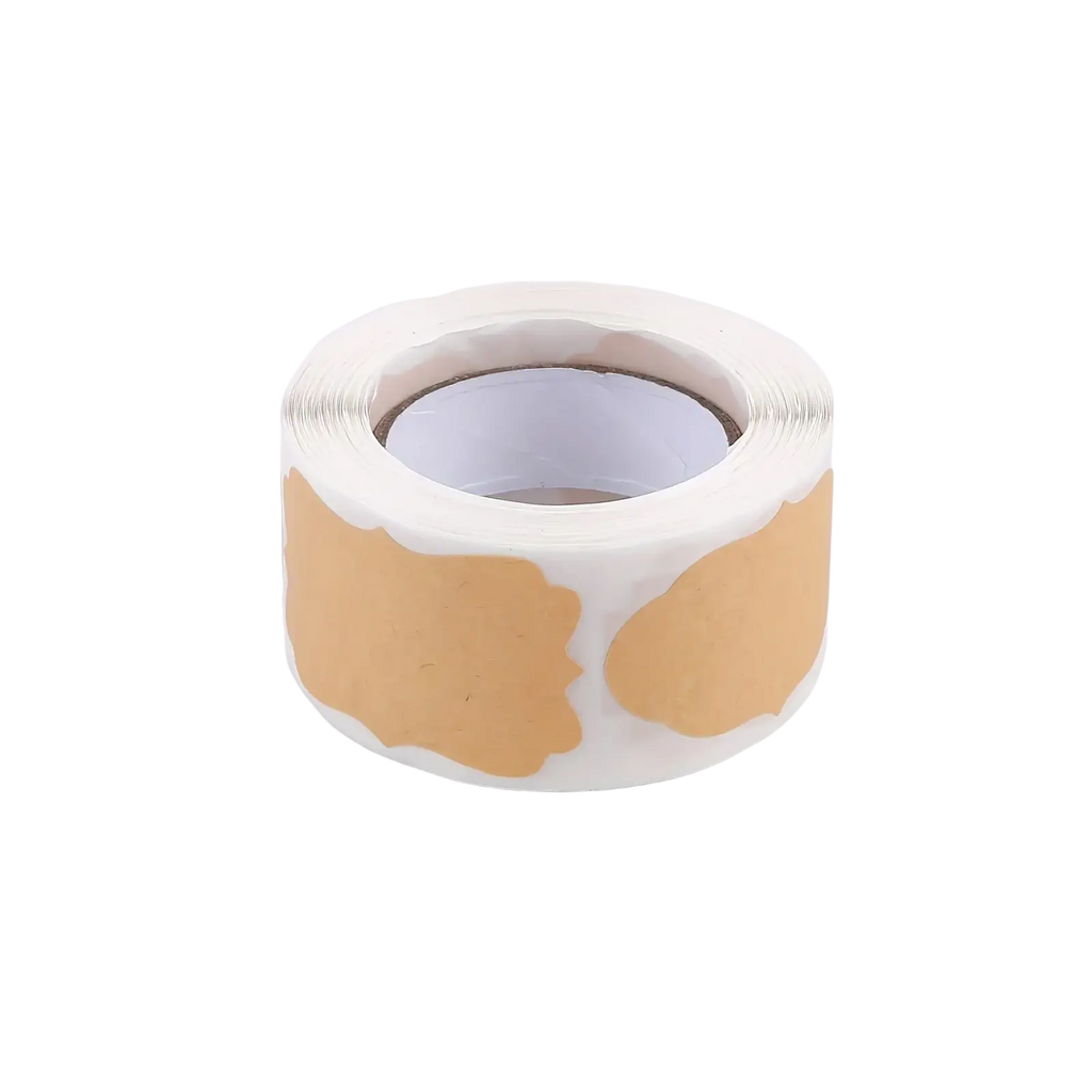 A roll of 250 beige adhesive paper stickers with backing for christmas decorations cosmetics and crafts use