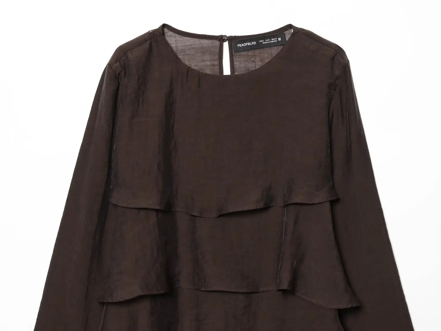 A dark brown chiffon blouse with long layered ruffle sleeves and a subtle sheen featuring a flare sleeve style.