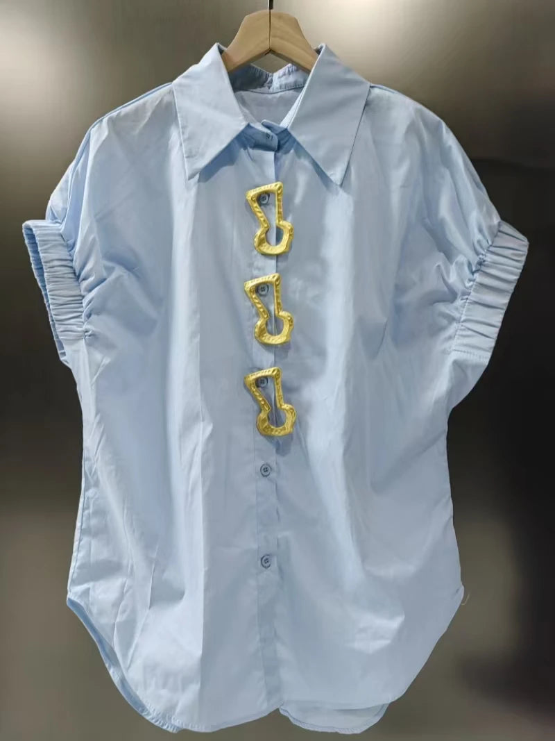 Light blue shirt short sleeve with turn-down collar and gold-tone hook-shaped buttons featuring a fashionable versatile design ideal for casual blusas.