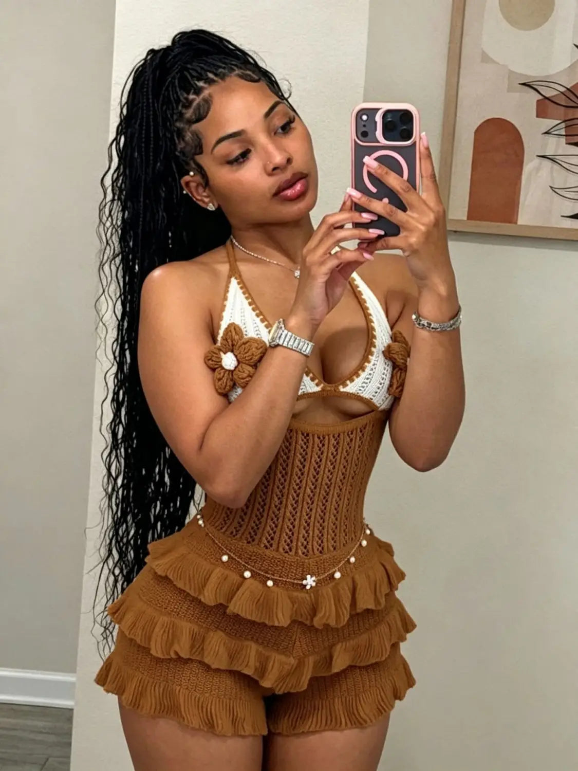 brown knitted ruffled two-piece summer playsuit with white crochet halter top and floral embellishments displayed from the back