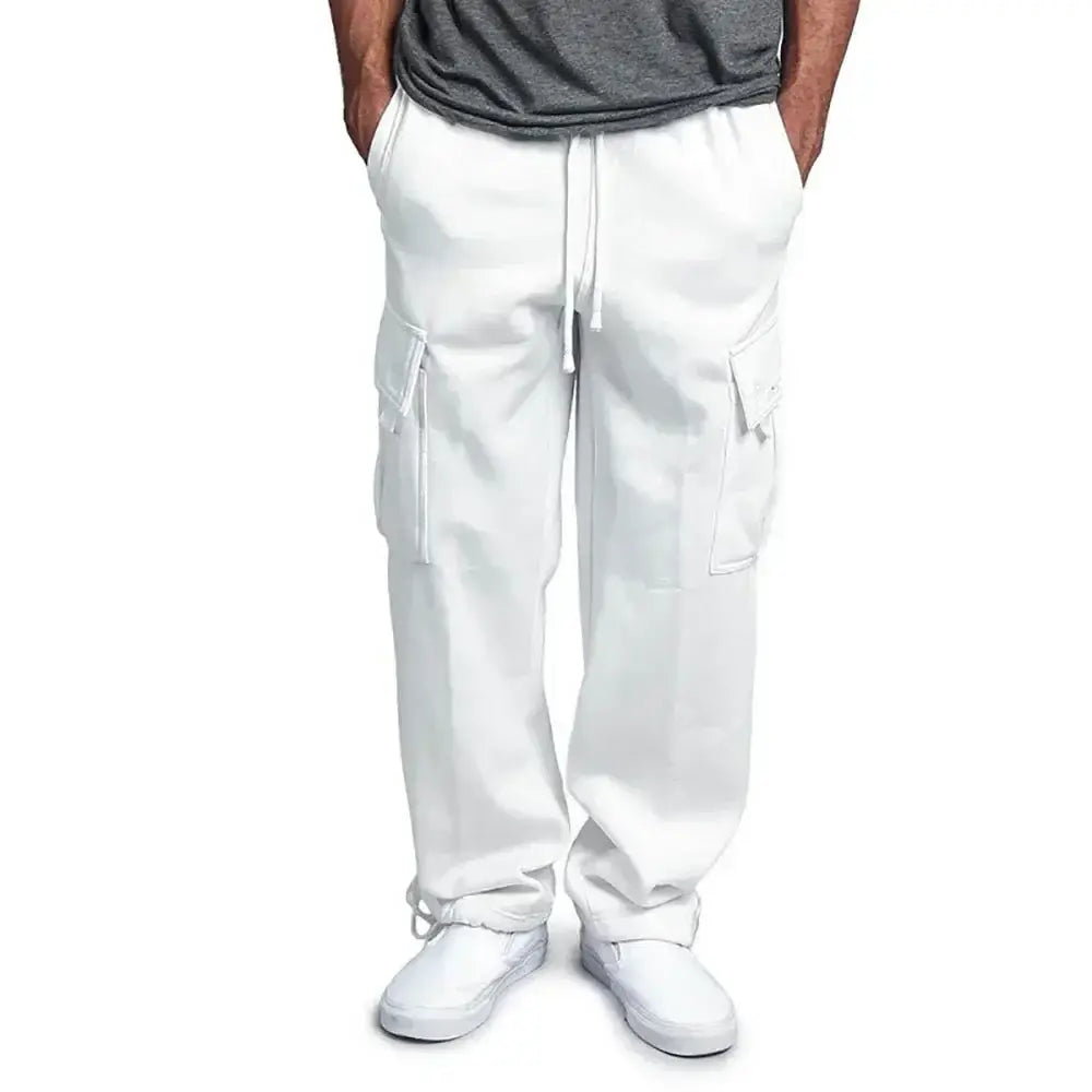 Pantalons cargo blancs pour homme avec une taille à cordon de serrage et plusieurs poches latérales, conçus pour une coupe ample et un jogging confortable.