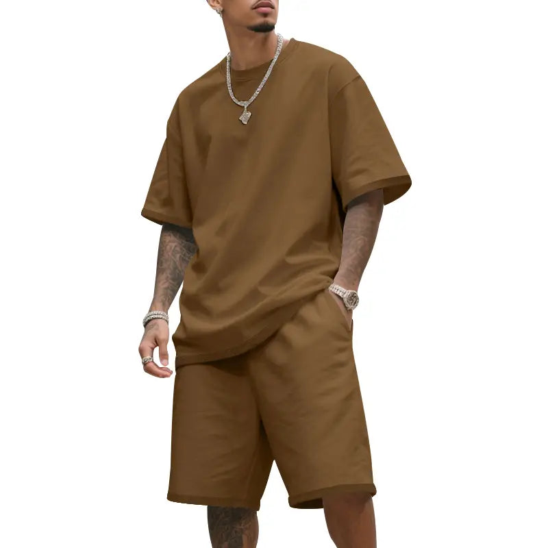 Camiseta de algodón marrón para hombre con ajuste relajado y mangas cortas, de la ropa de verano casual para hombre de dos piezas, camiseta y conjunto de pantalones cortos.