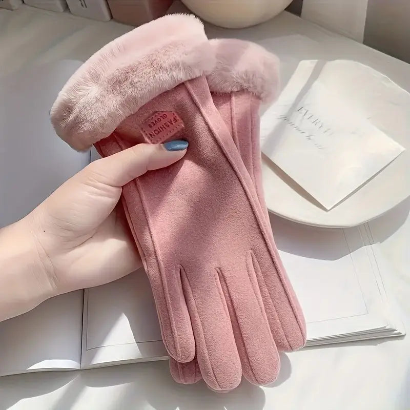 Soft pink suede women winter touchscreen gloves with plush fleece lining and windproof design showing the back side with a subtle brand tag on the wrist.