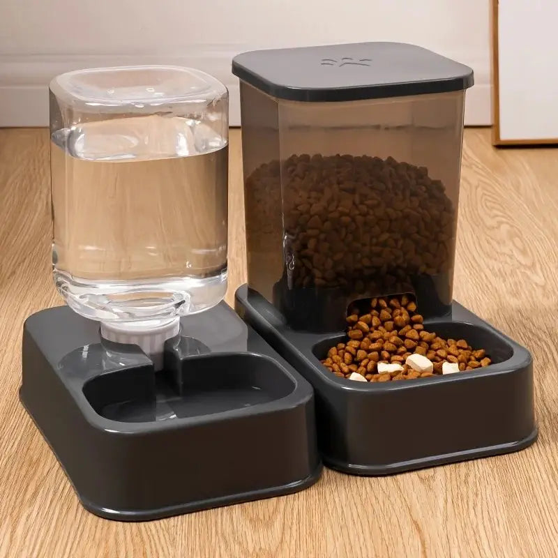 Black plastic automatic pet feeder with transparent water bowl and food container featuring a sleek modern design for convenient automatic pet feeding.